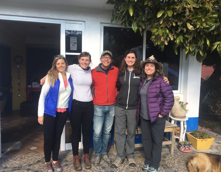 A group of scientists taking a photo together, including Emma Pelton, our monarch specialist.